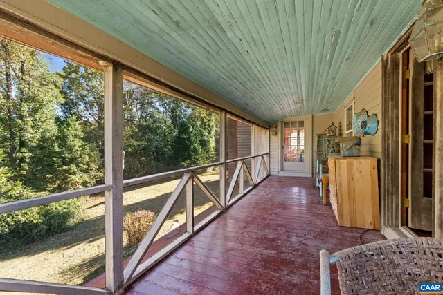 a bedroom with bed and a window