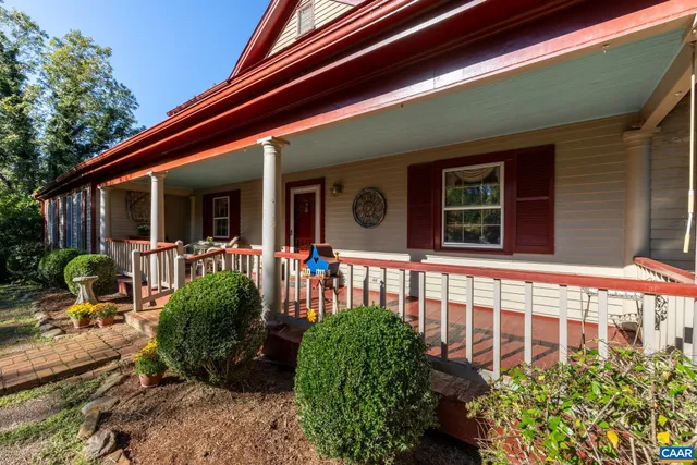 a view of entryway with wooden floor and stairs