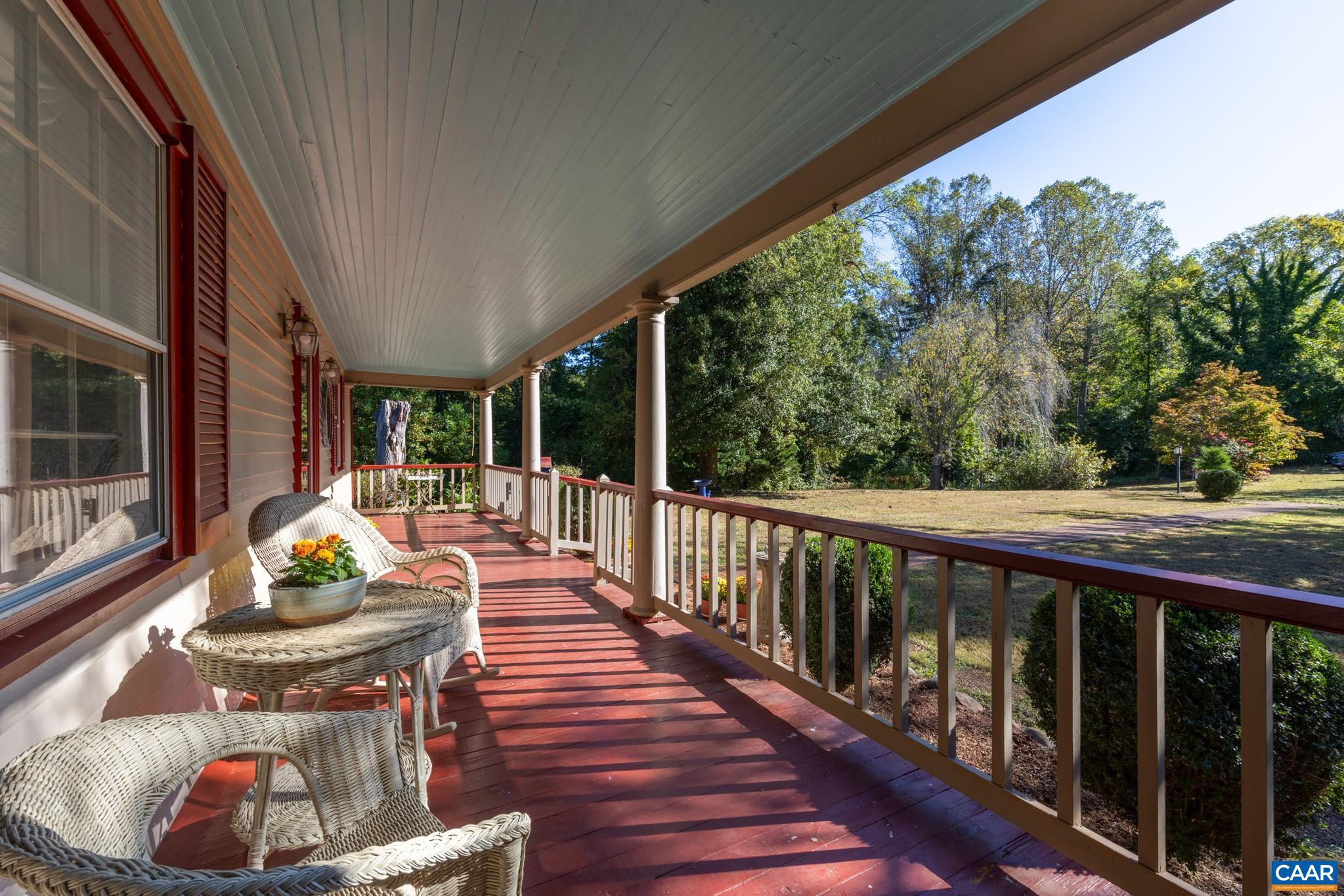 9290 Old Green Mountain Road Esmont, VA 22937 - Photo 7 of 54 a view of a two chairs in the balcony