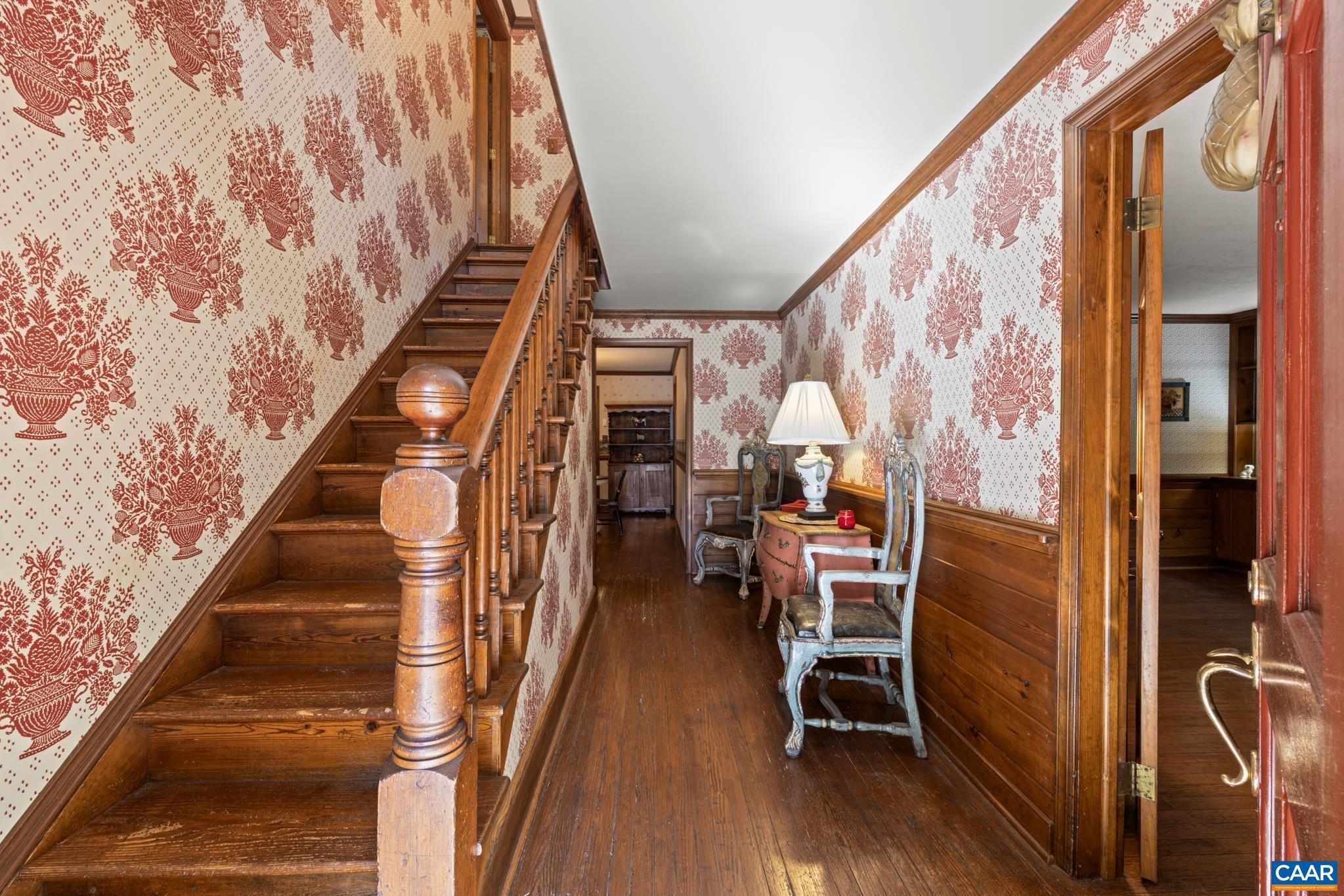 9290 Old Green Mountain Road Esmont, VA 22937 - Photo 9 of 54 a view of entryway with wooden floor and stairs
