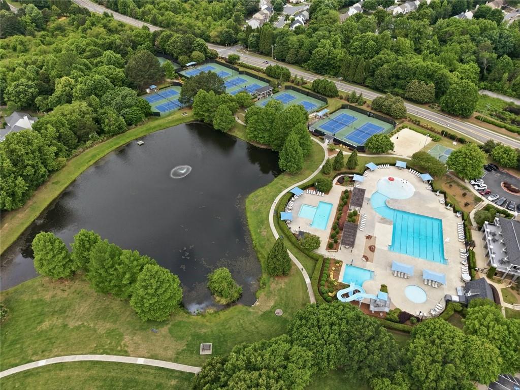 3820 Yaupon Way Cumming, GA 30040 - Photo 13 of 15 an aerial view of a house with a yard and lake view