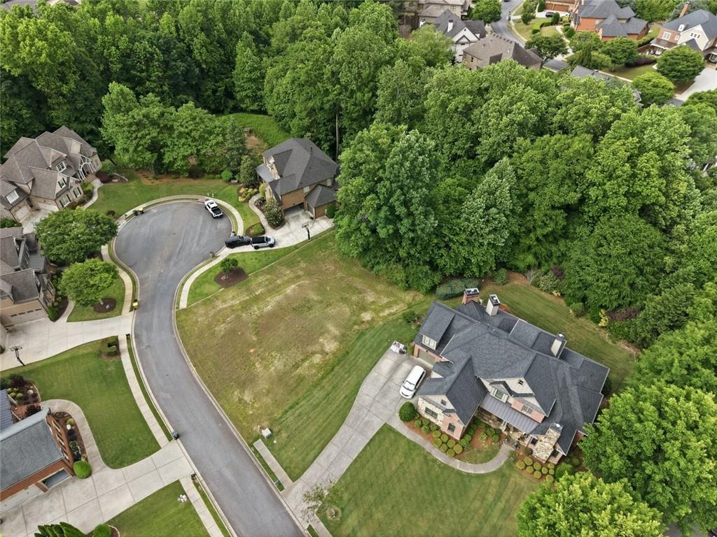 3820 Yaupon Way Cumming, GA 30040 - Photo 4 of 15 an aerial view of a swimming pool and outdoor space