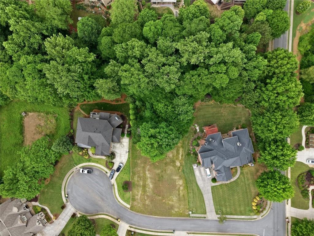 3820 Yaupon Way Cumming, GA 30040 - Photo 8 of 15 an aerial view of a house with outdoor space
