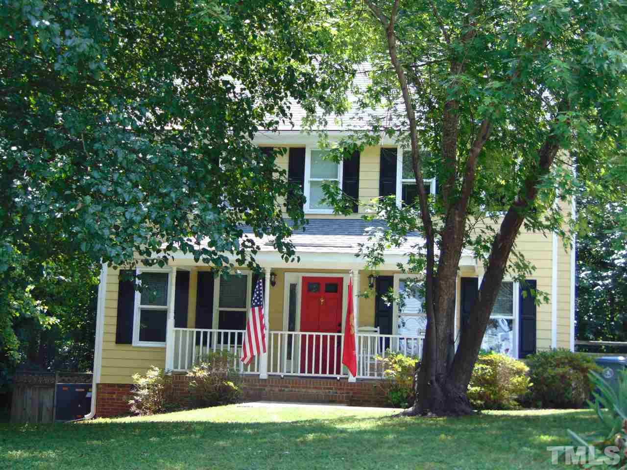 116 Crosspine Drive Raleigh, NC 27603 - Photo 2 of 21 a front view of a house with a garden