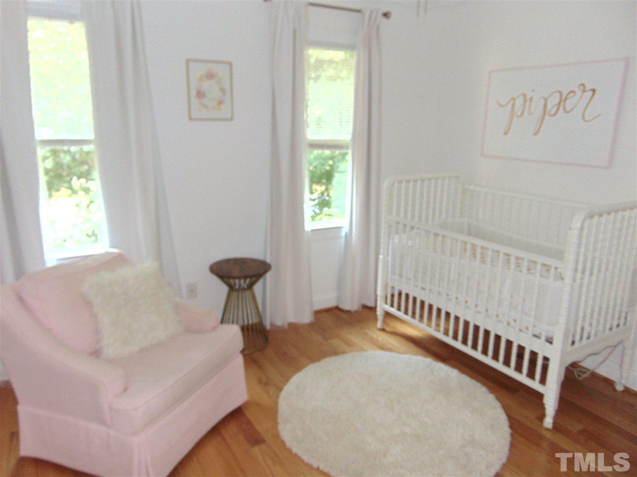 116 Crosspine Drive Raleigh, NC 27603 - Photo 17 of 21 a view of a livingroom with furniture and staircase