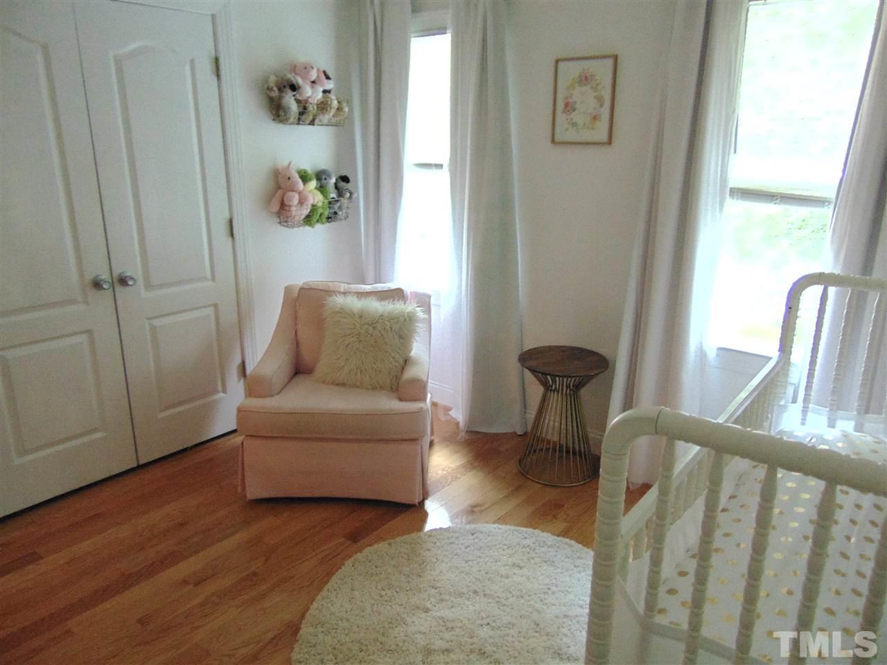 116 Crosspine Drive Raleigh, NC 27603 - Photo 18 of 21 a living room with furniture and a window