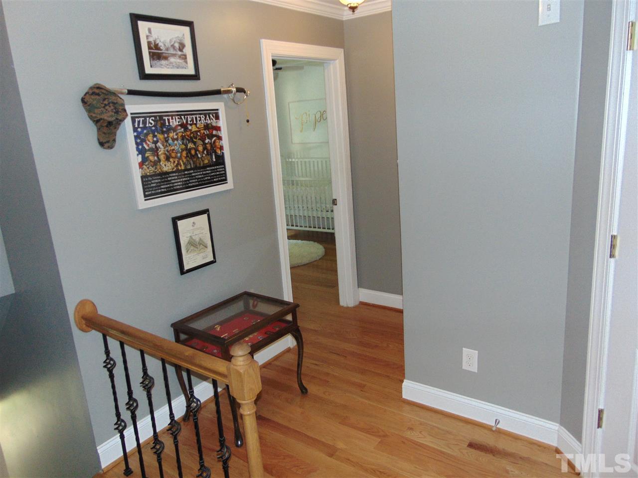 116 Crosspine Drive Raleigh, NC 27603 - Photo 20 of 21 a room with furniture and wooden floor