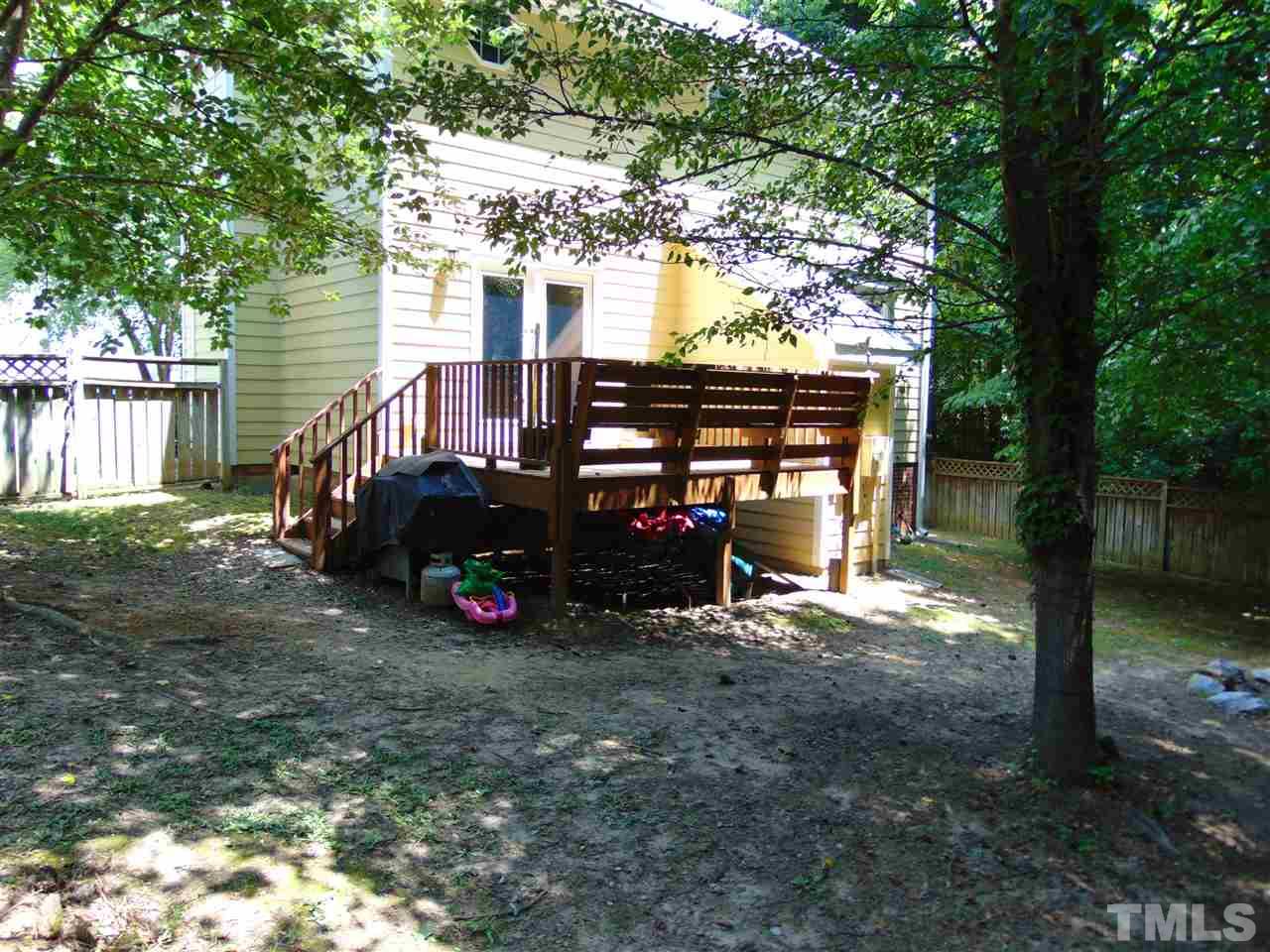 116 Crosspine Drive Raleigh, NC 27603 - Photo 3 of 21 a view of outdoor space with deck and tree