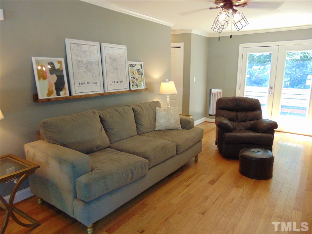 116 Crosspine Drive Raleigh, NC 27603 - Photo 5 of 21 a living room with furniture and a large window