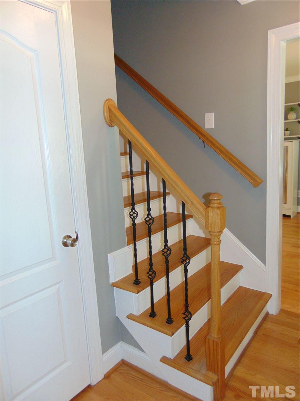 116 Crosspine Drive Raleigh, NC 27603 - Photo 7 of 21 a view of entryway with wooden floor