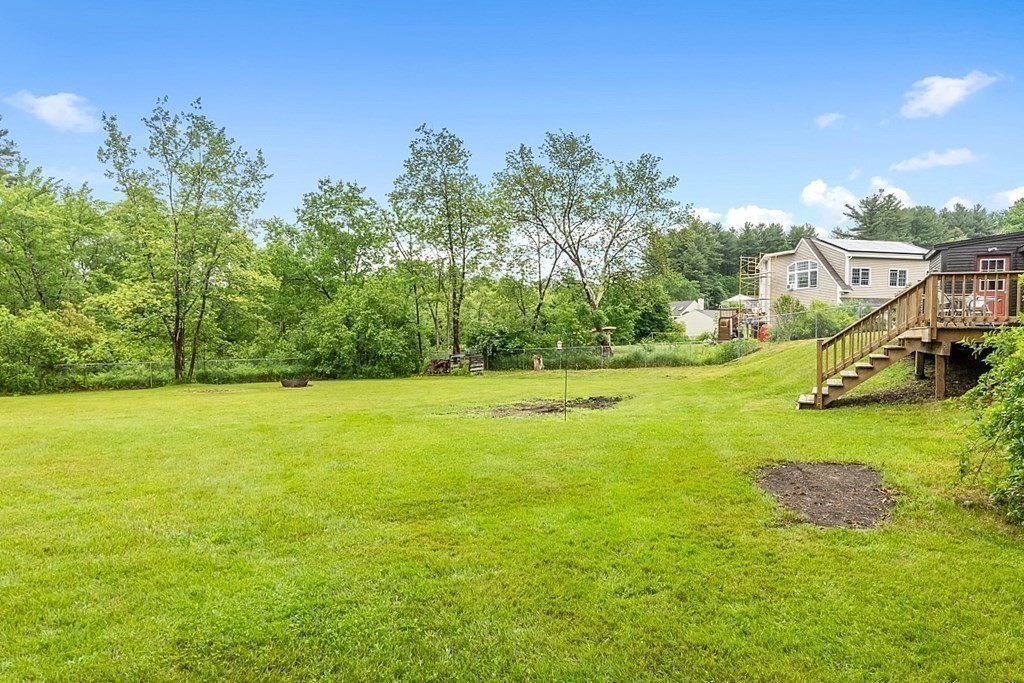 7 Groton-Shirley Road Ayer, MA 01432 - Photo 31 of 42 a view of a big yard with swimming pool