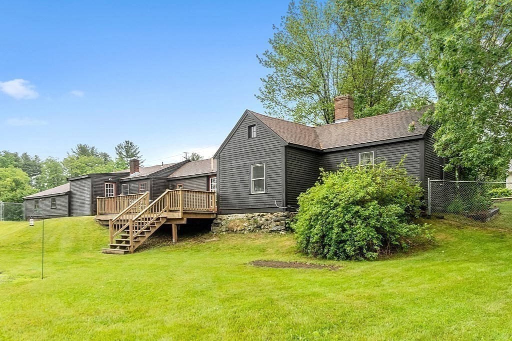 7 Groton-Shirley Road Ayer, MA 01432 - Photo 32 of 42 a house view with a garden space