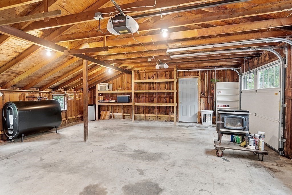 7 Groton-Shirley Road Ayer, MA 01432 - Photo 40 of 42 a view of a room with gym equipment