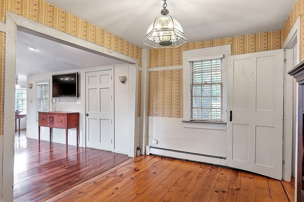 7 Groton-Shirley Road Ayer, MA 01432 - Photo 4 of 42 a view of a livingroom with a furniture wooden floor and window