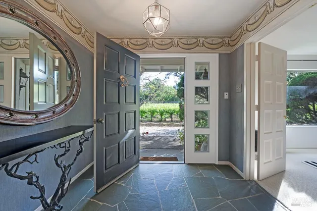 a view of entryway with a front door