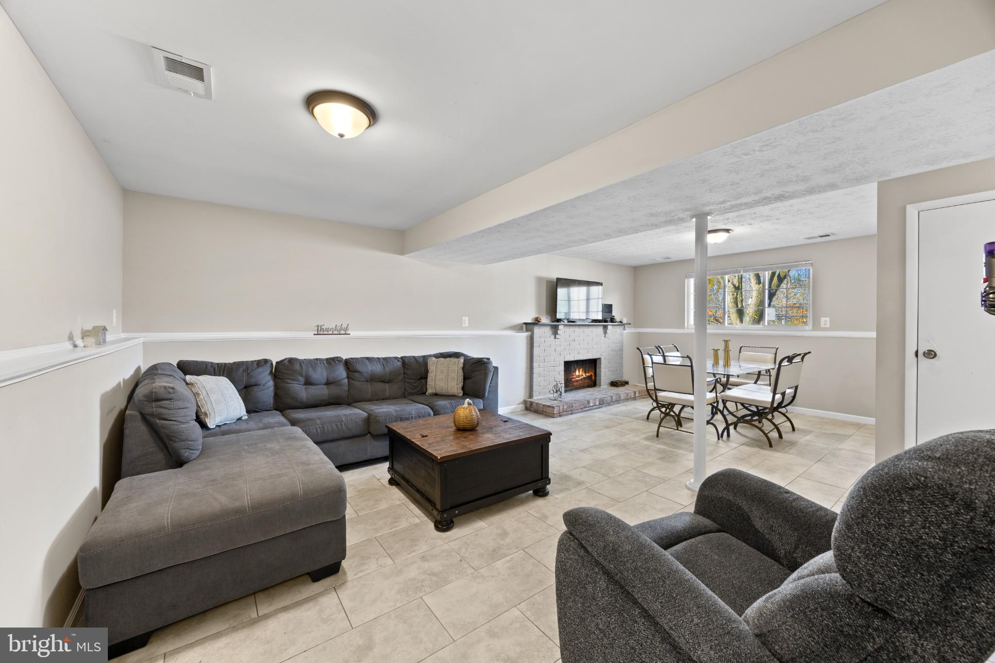 8600 Temple Hill Road Clinton, MD 20735 - Photo 16 of 31 a living room with furniture and a table