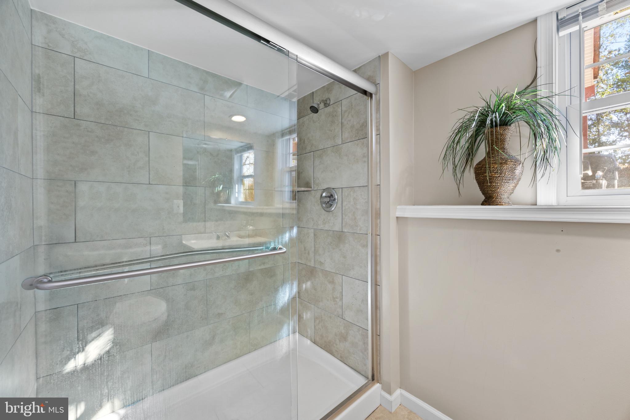 8600 Temple Hill Road Clinton, MD 20735 - Photo 20 of 31 a bathroom with a shower and a sink