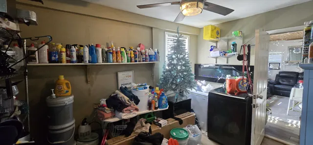 a living room with furniture and a window