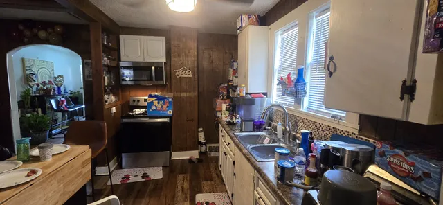 a view of a house with a street