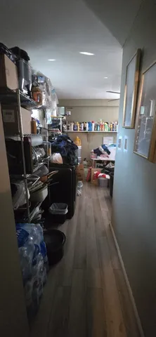 a bathroom with a toilet a sink and a mirror