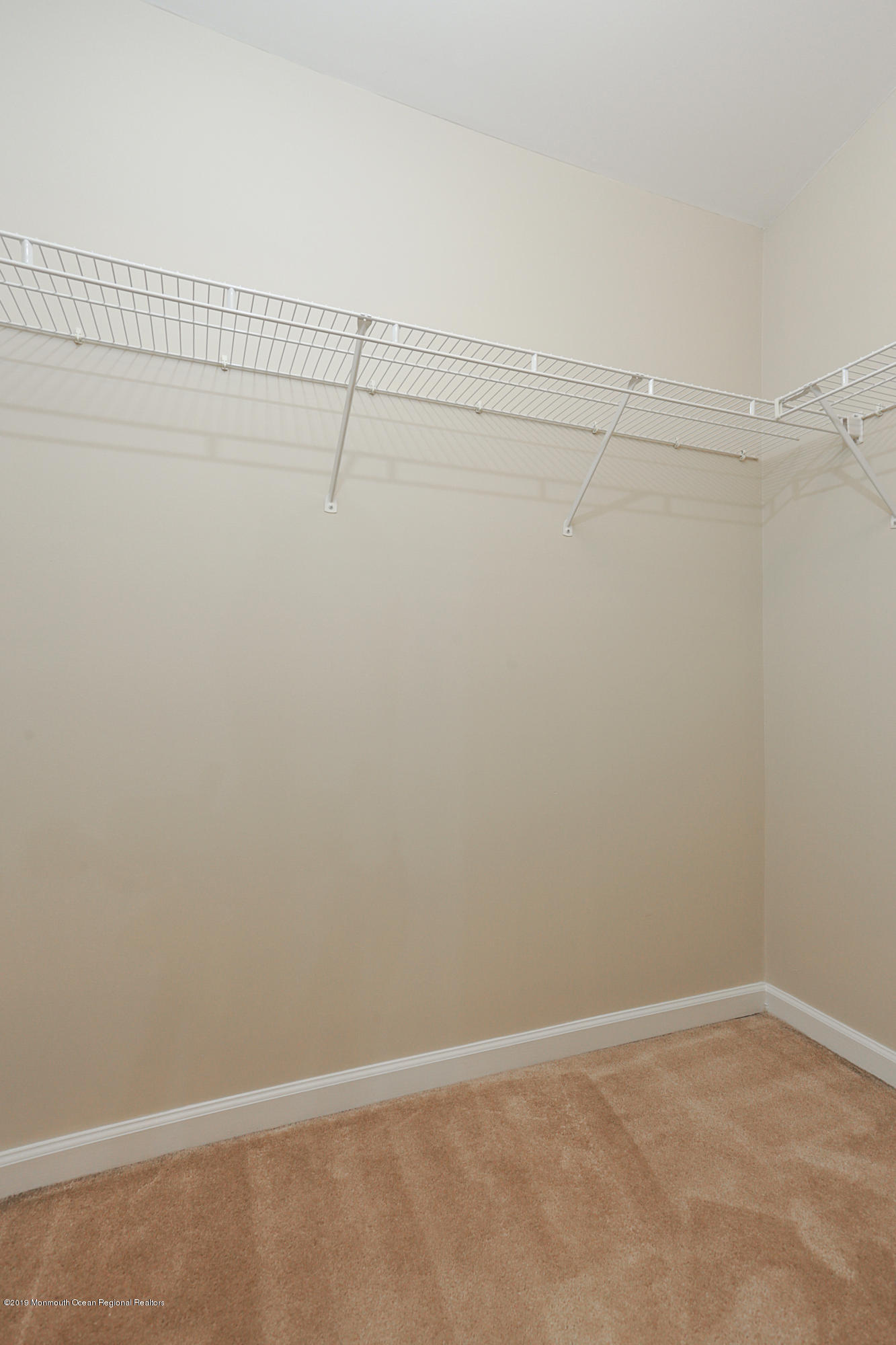 31 Abby Road Farmingdale, NJ 07727 - Photo 20 of 23 a view of small space with racks on the wall