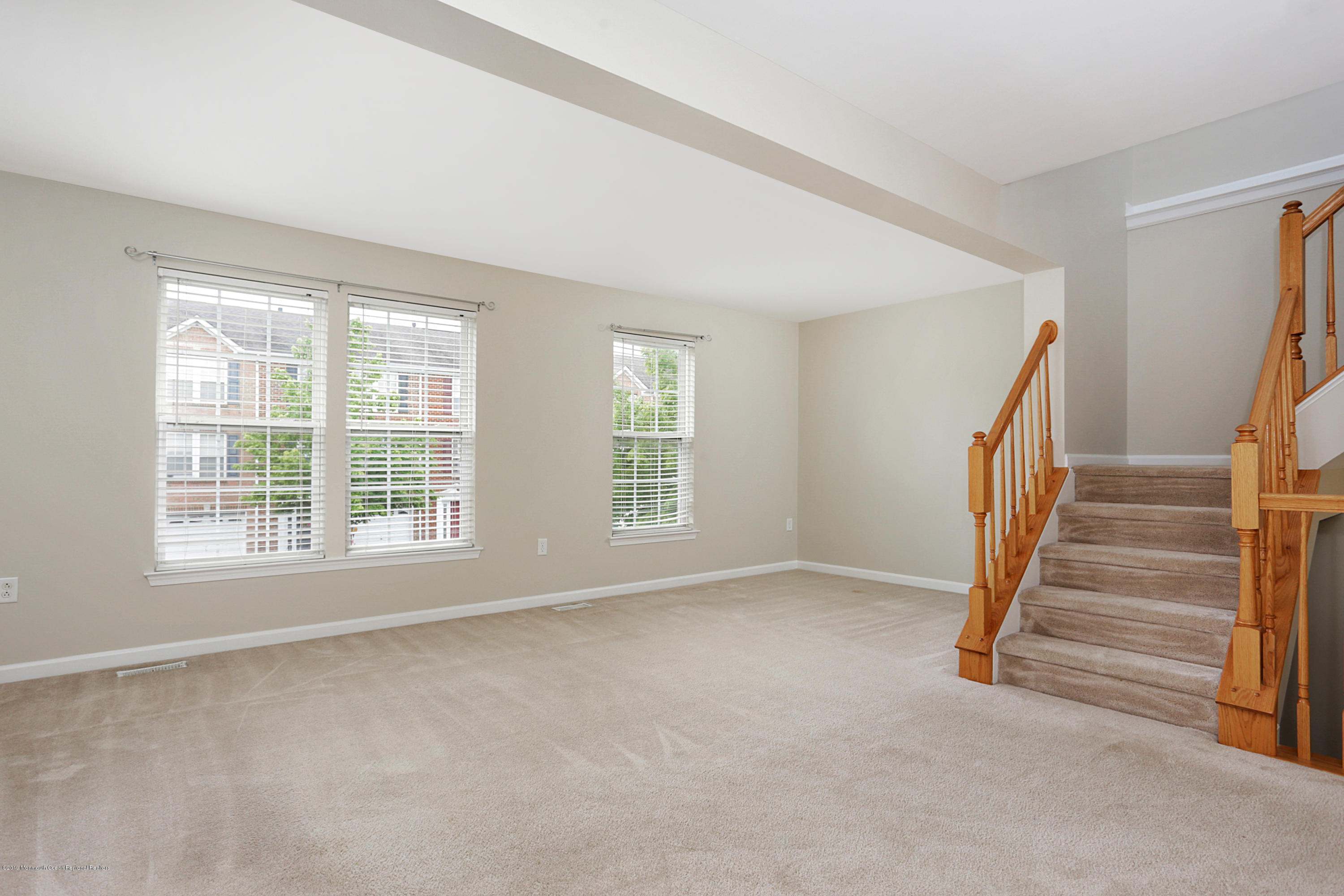 31 Abby Road Farmingdale, NJ 07727 - Photo 8 of 23 a view of an empty room with a window