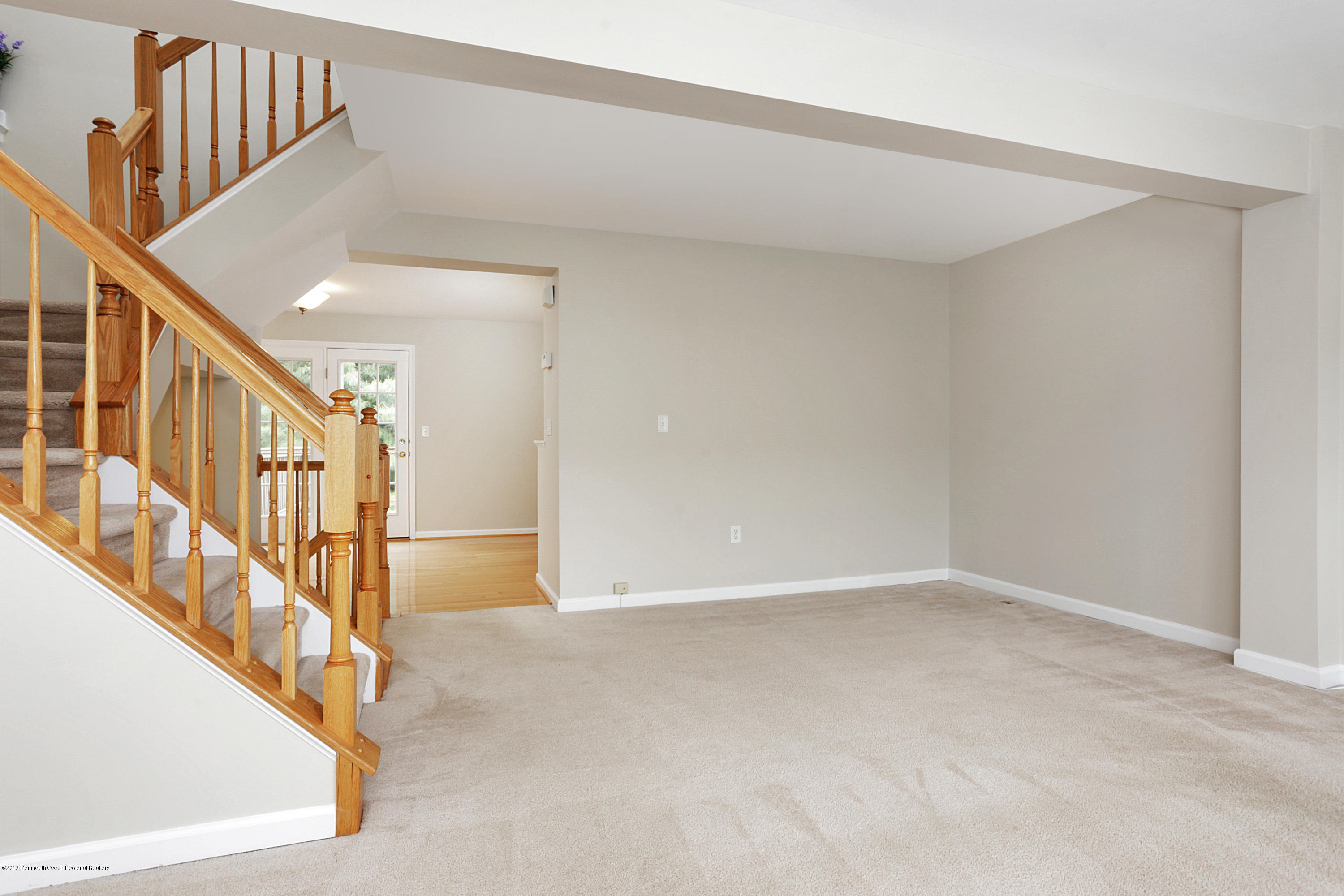 31 Abby Road Farmingdale, NJ 07727 - Photo 10 of 23 a view of an entryway with wooden floor