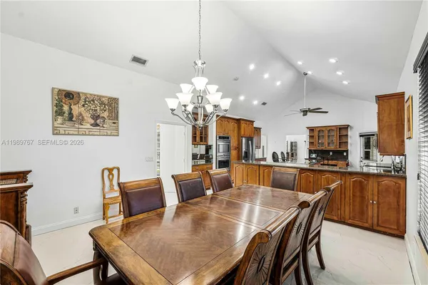 a view of a dining room with furniture