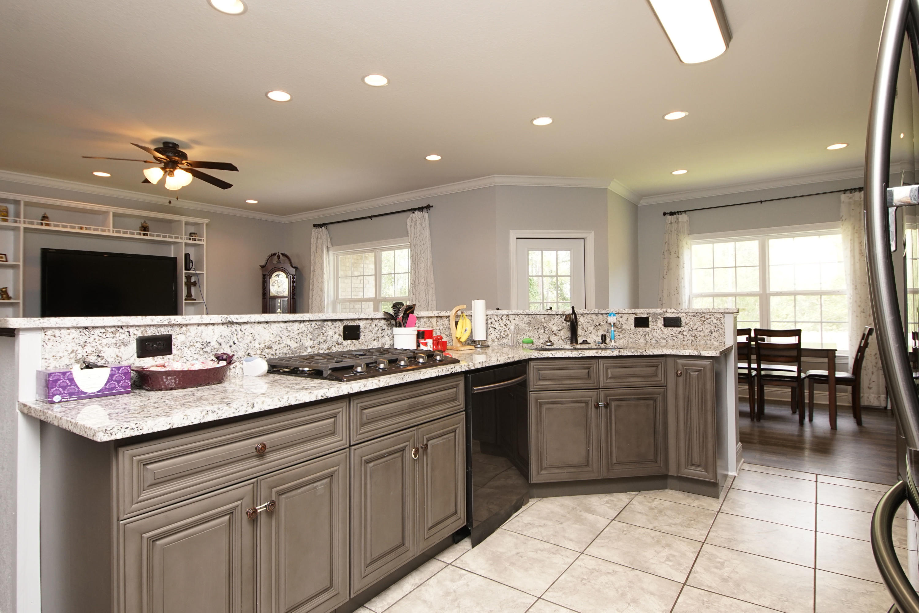 4520 Hermosa Road Crestview, FL 32536 - Photo 11 of 43 a kitchen with a sink and a stove top oven