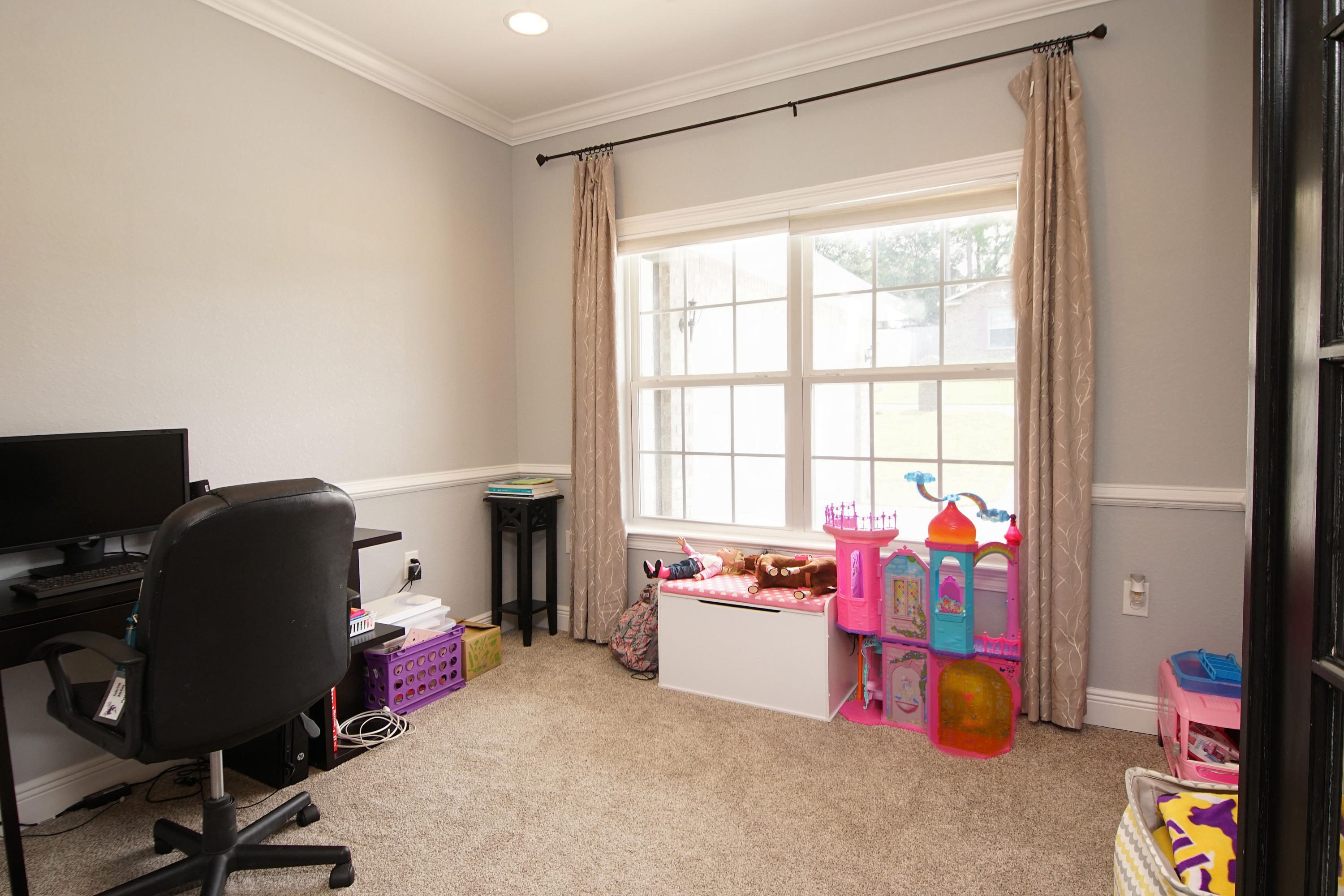 4520 Hermosa Road Crestview, FL 32536 - Photo 23 of 43 a view of a workspace with furniture and a window