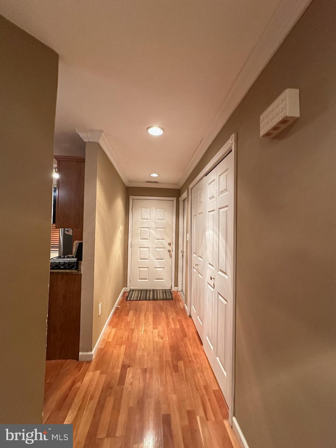 29 Gate House Lane Edison, NJ 08820 - Photo 14 of 35 a view of empty room with wooden floor and fan