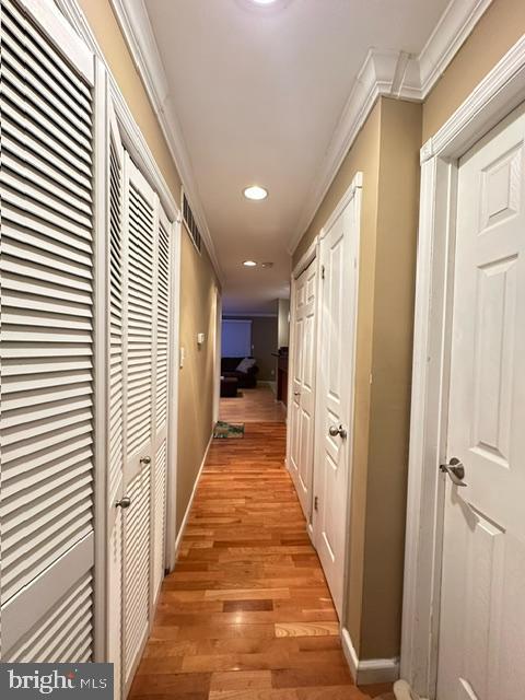 29 Gate House Lane Edison, NJ 08820 - Photo 24 of 35 a view of a hallway with wooden floor and staircase