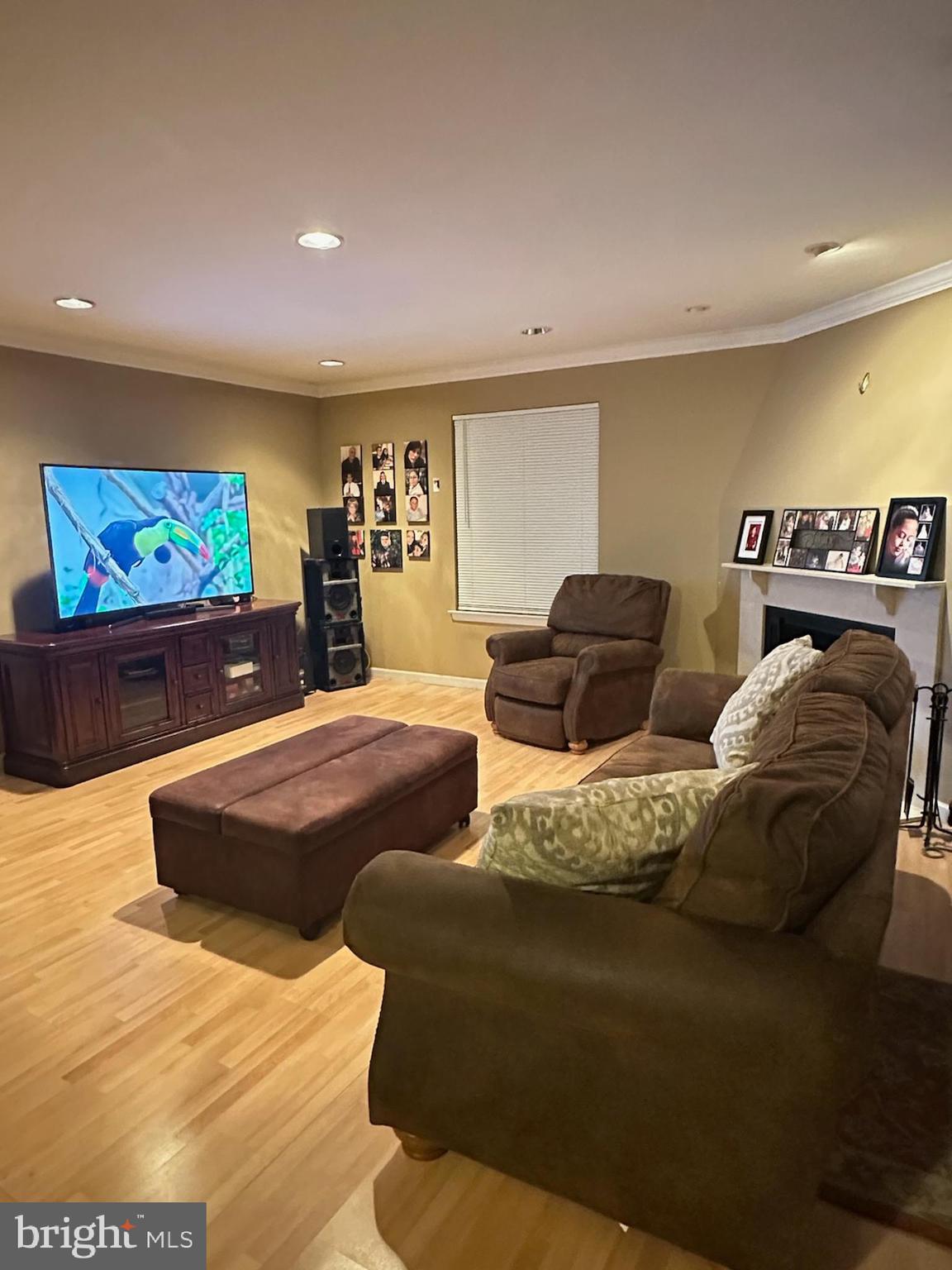 29 Gate House Lane Edison, NJ 08820 - Photo 8 of 35 a living room with furniture a large screen and a flat screen tv