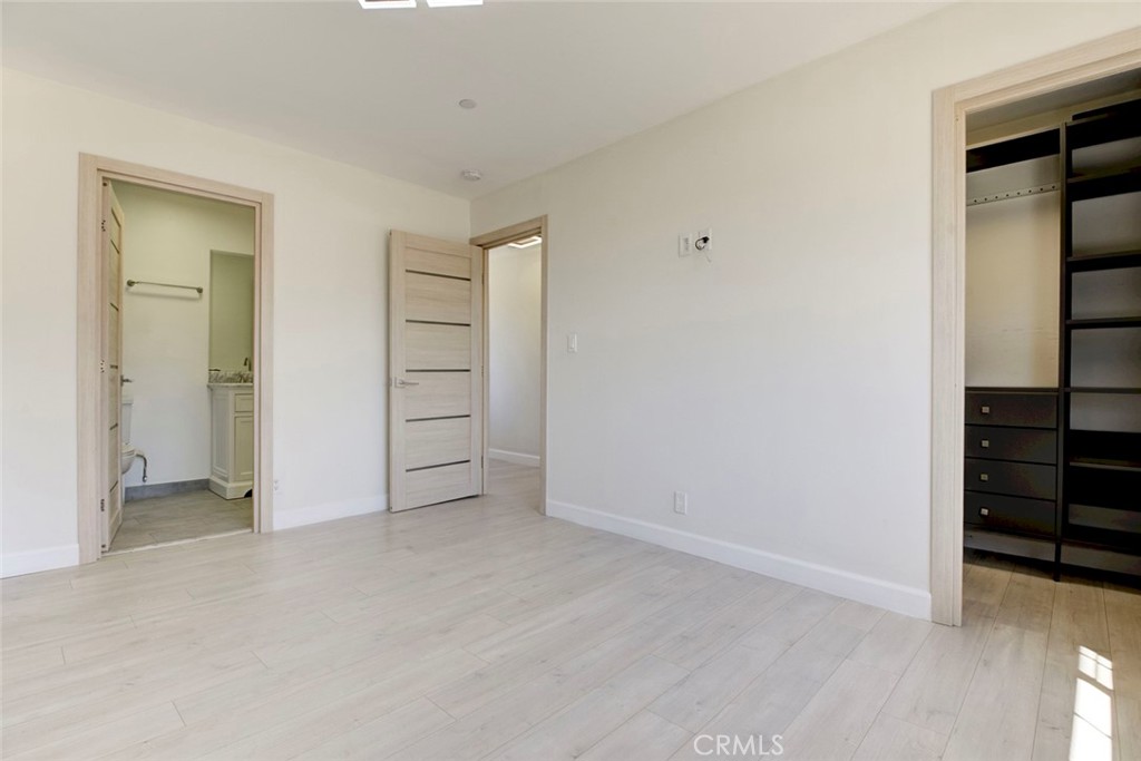 7044-1 Greeley Street Tujunga, CA 91042 - Photo 26 of 27 wooden floor and closet in a room