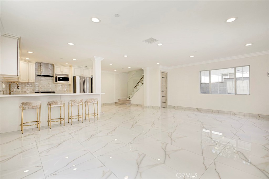 7044-1 Greeley Street Tujunga, CA 91042 - Photo 5 of 27 a view of kitchen with stainless steel appliances refrigerator oven and cabinets