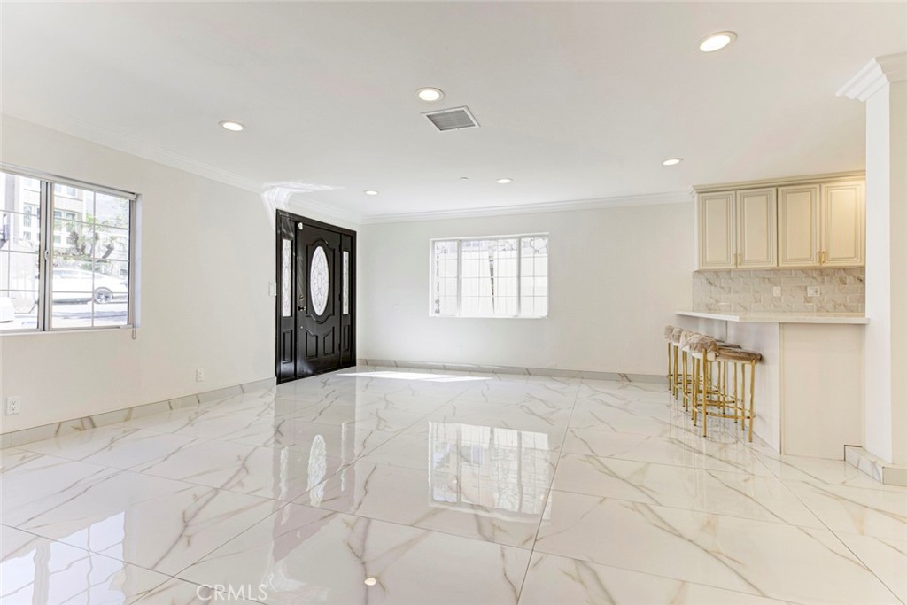 7044-1 Greeley Street Tujunga, CA 91042 - Photo 6 of 27 a view of an empty room with a window