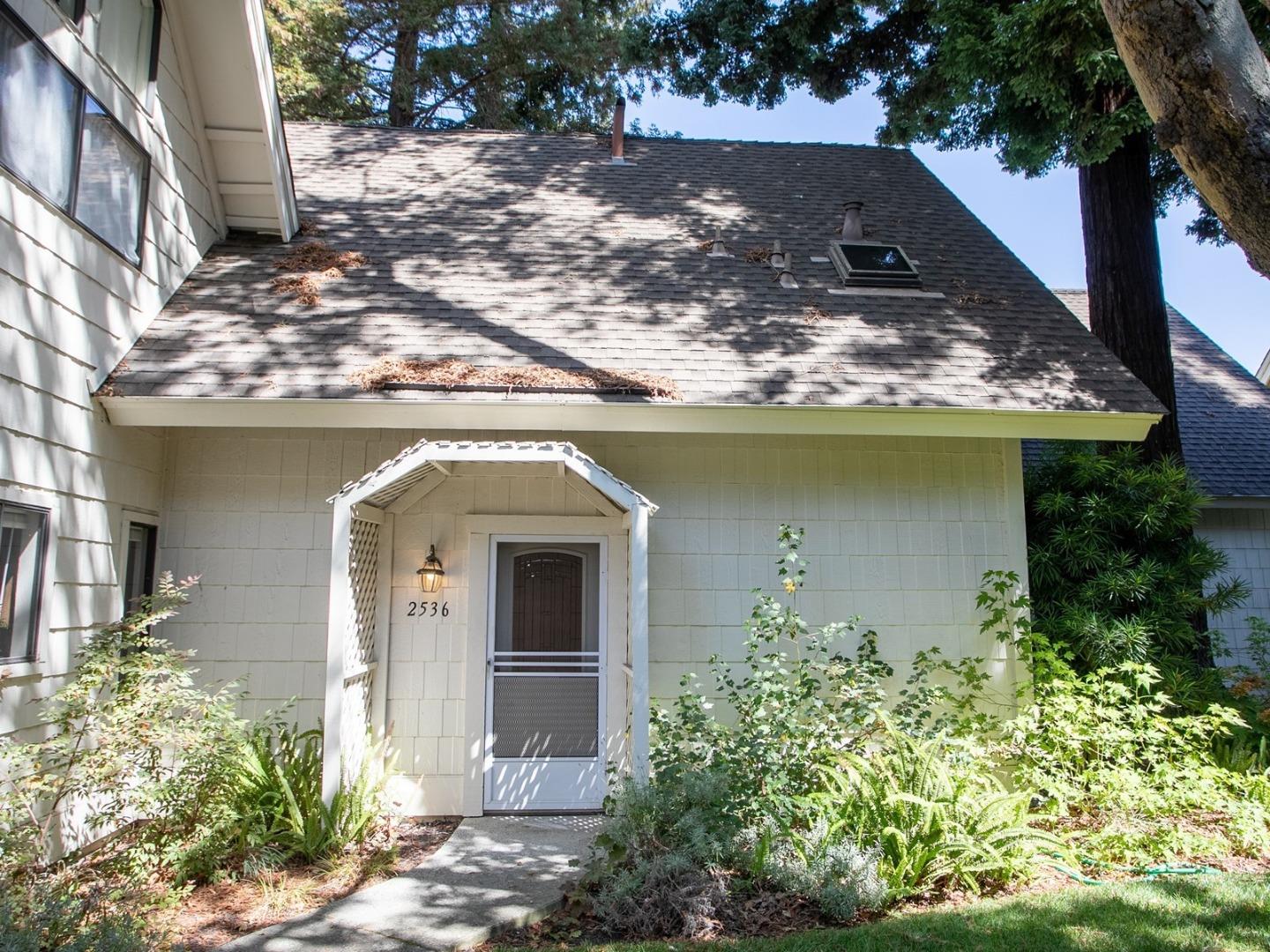 2536 West Middlefield Road Mountain View, CA 94043 - Photo 3 of 16 a front view of a house with garden