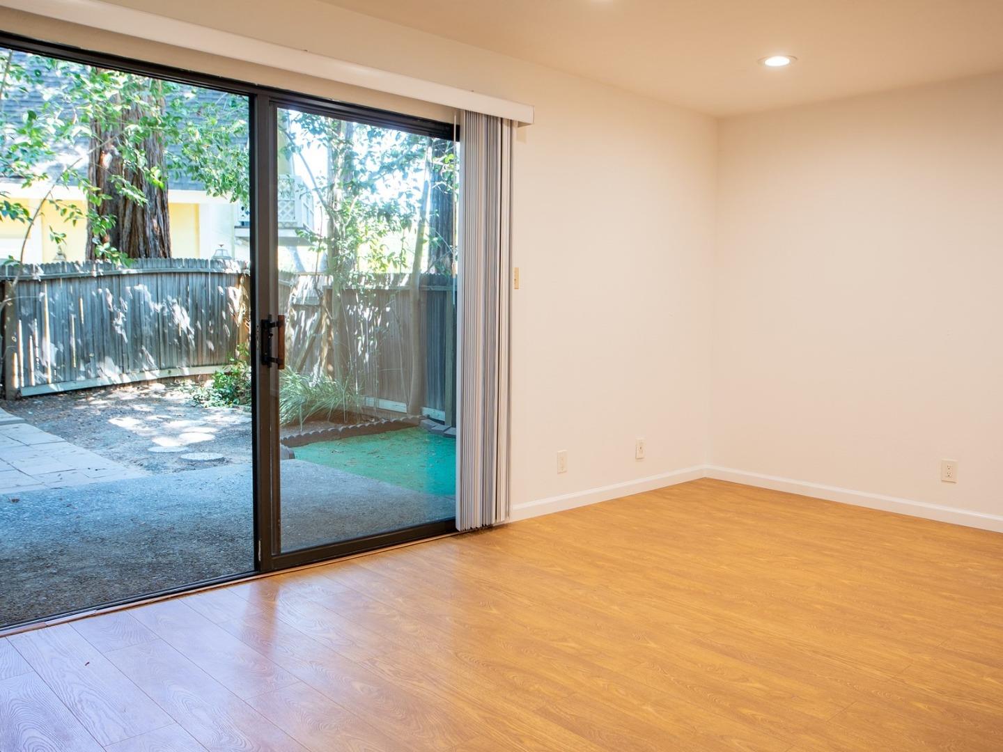 2536 West Middlefield Road Mountain View, CA 94043 - Photo 5 of 16 a view of an empty room with a window