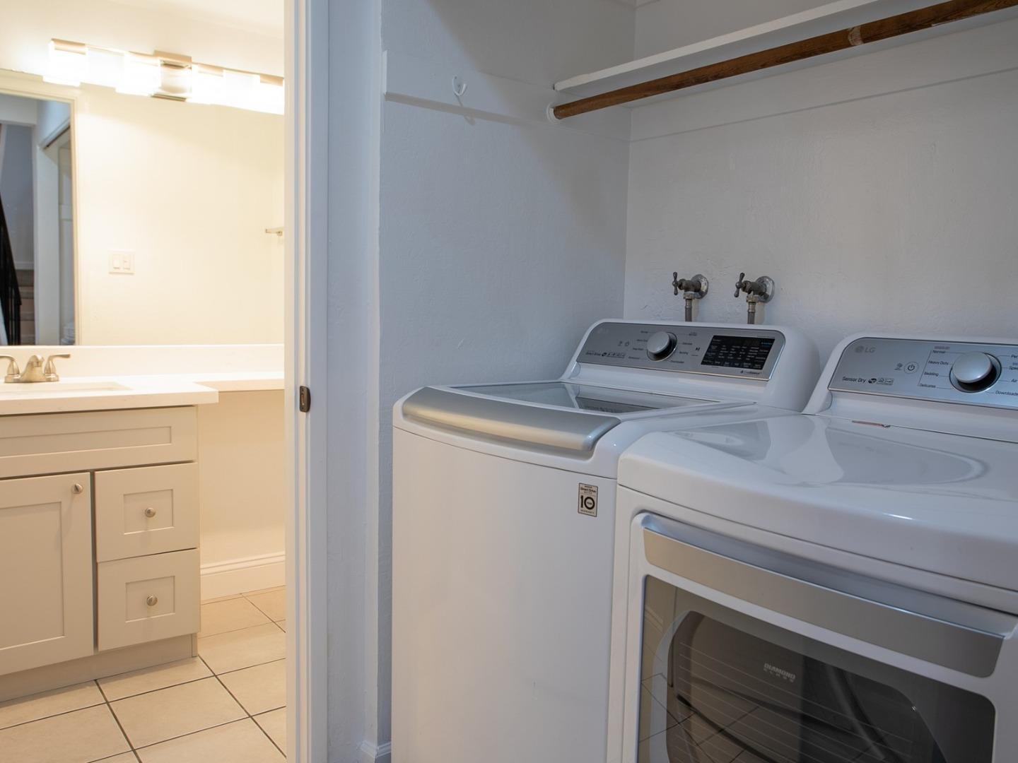 2536 West Middlefield Road Mountain View, CA 94043 - Photo 7 of 16 a utility room with dryer and washer