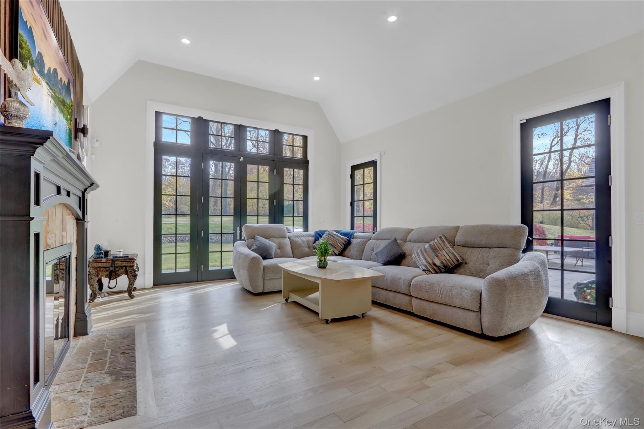 119 Wheatley Road Old Westbury, NY 11568 - Photo 21 of 45 a living room with furniture and a large window