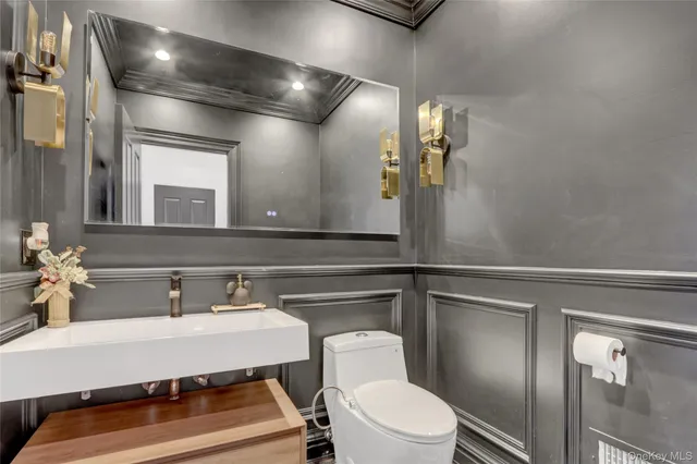 a bathroom with a shower and a sink