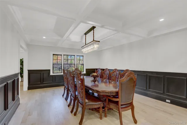 a kitchen with stainless steel appliances granite countertop a sink and a stove top oven