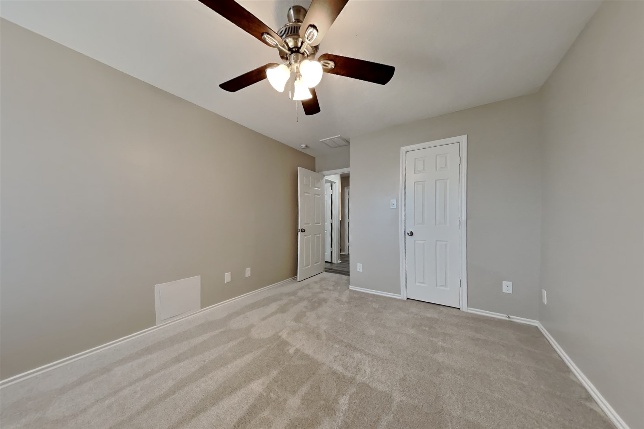 3502 Avalon Spring Lane Spring, TX 77386 - Photo 12 of 20 en empty room with ceiling fan and window