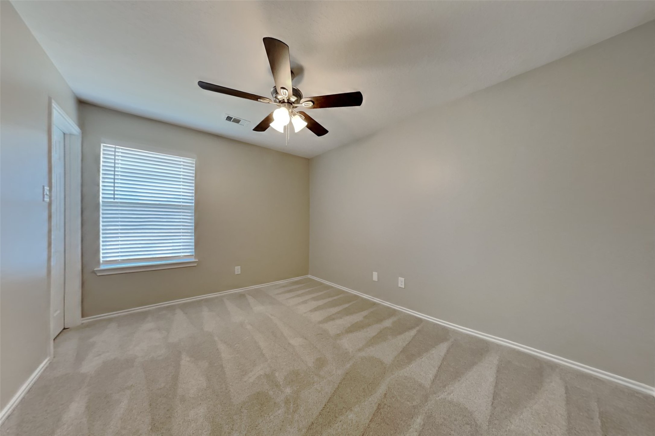 3502 Avalon Spring Lane Spring, TX 77386 - Photo 15 of 20 a view of room with ceiling fan and window