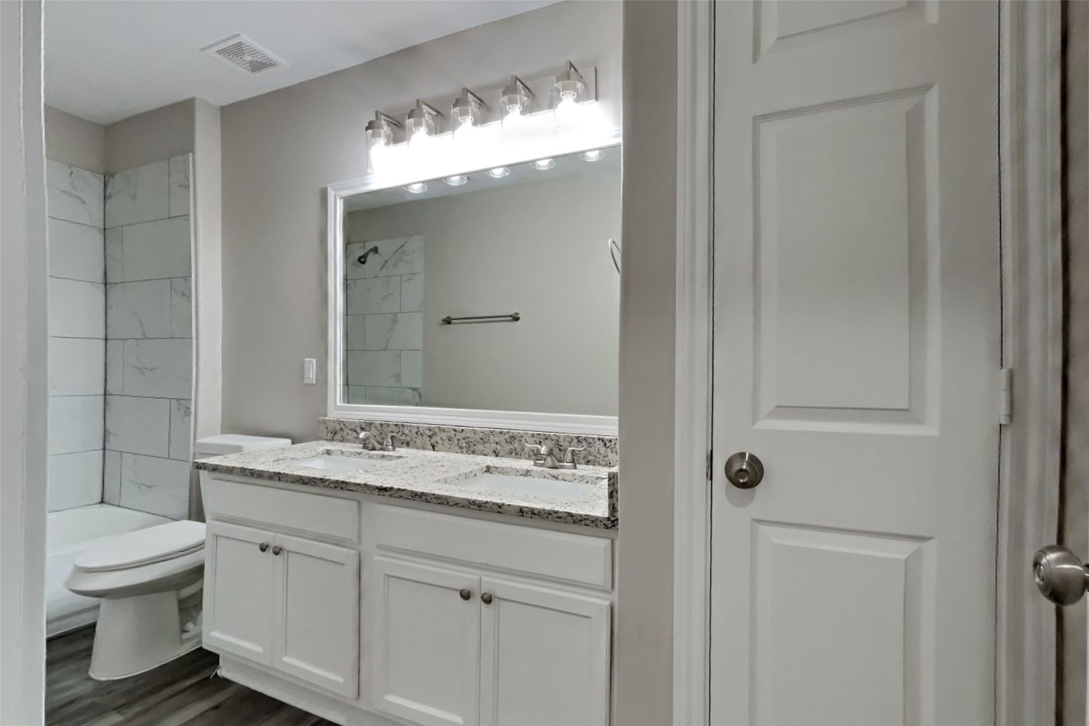 3502 Avalon Spring Lane Spring, TX 77386 - Photo 16 of 20 a bathroom with a sink a toilet and a mirror