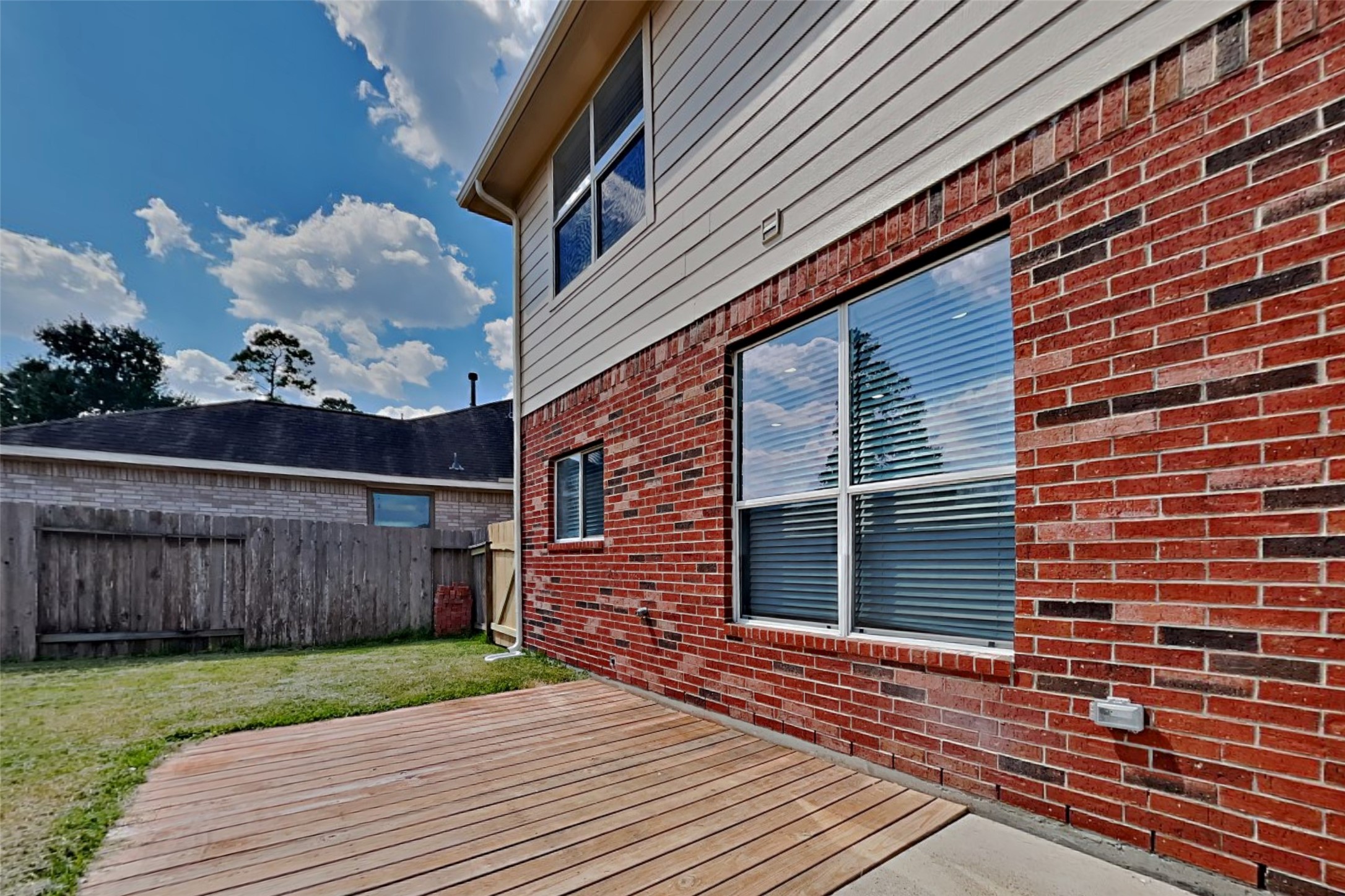 3502 Avalon Spring Lane Spring, TX 77386 - Photo 17 of 20 a view of a house with a yard and wooden floor