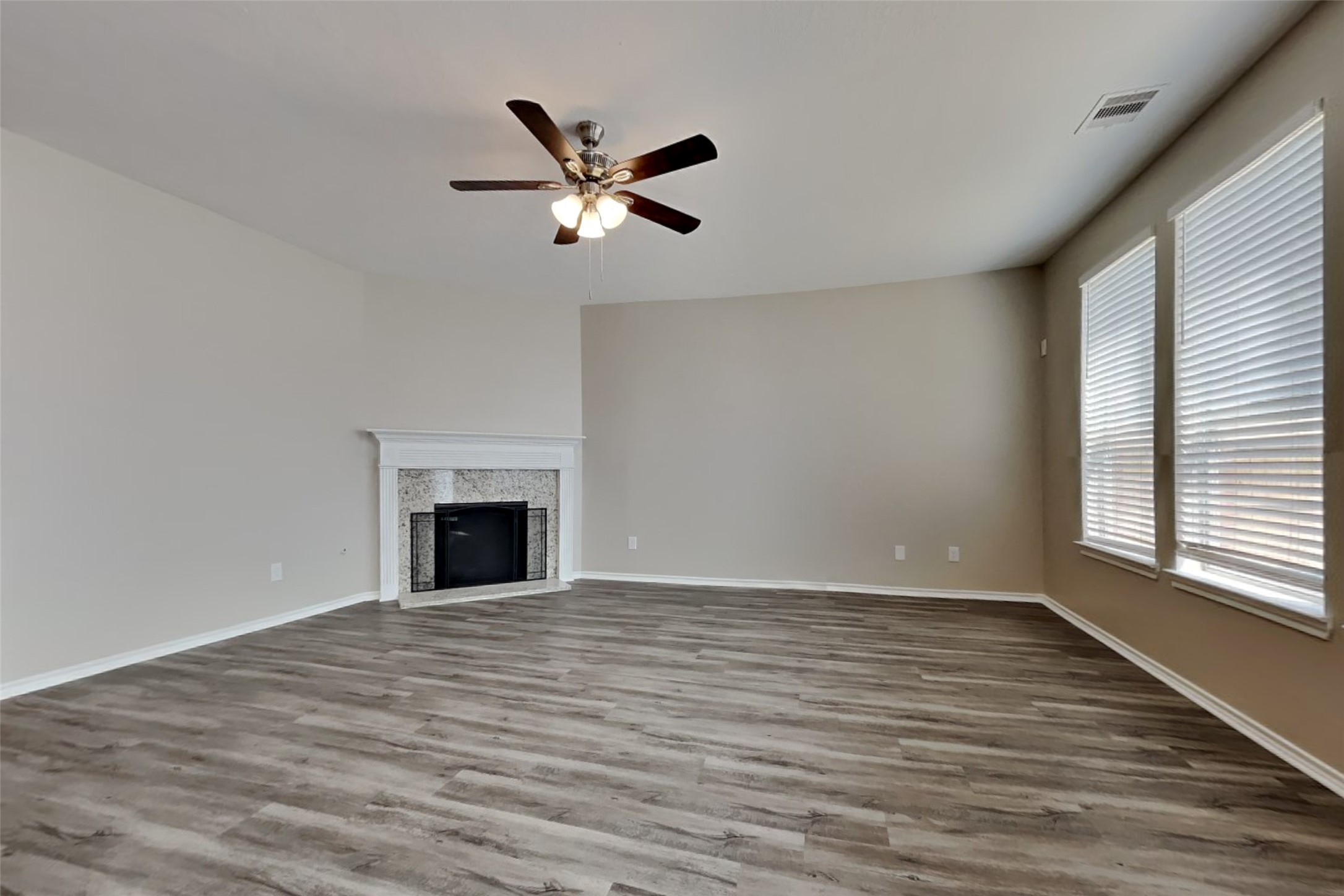 3502 Avalon Spring Lane Spring, TX 77386 - Photo 2 of 20 a view of empty room with wooden floor and fan
