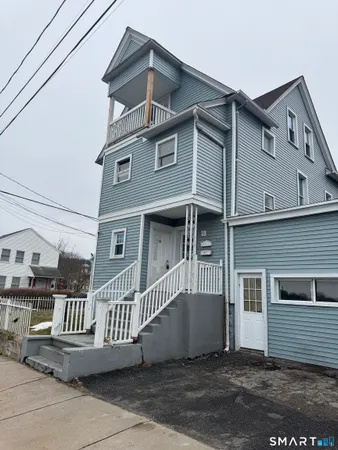 a front view of a house with a porch