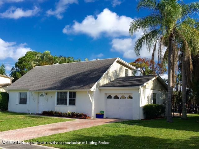409 Chevron Circle Jupiter, FL 33458 - Photo 1 of 18 01 Front View
