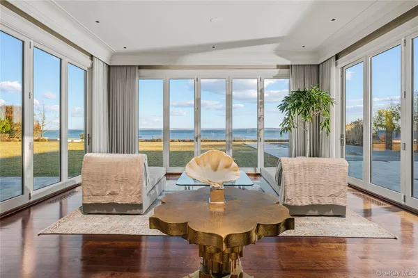 a dining table with chair and window